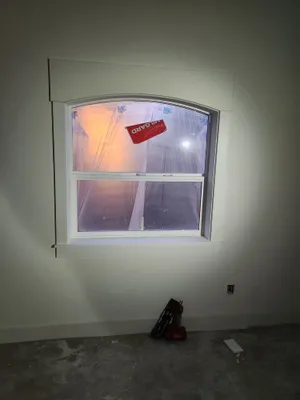 Arched window with new trim
