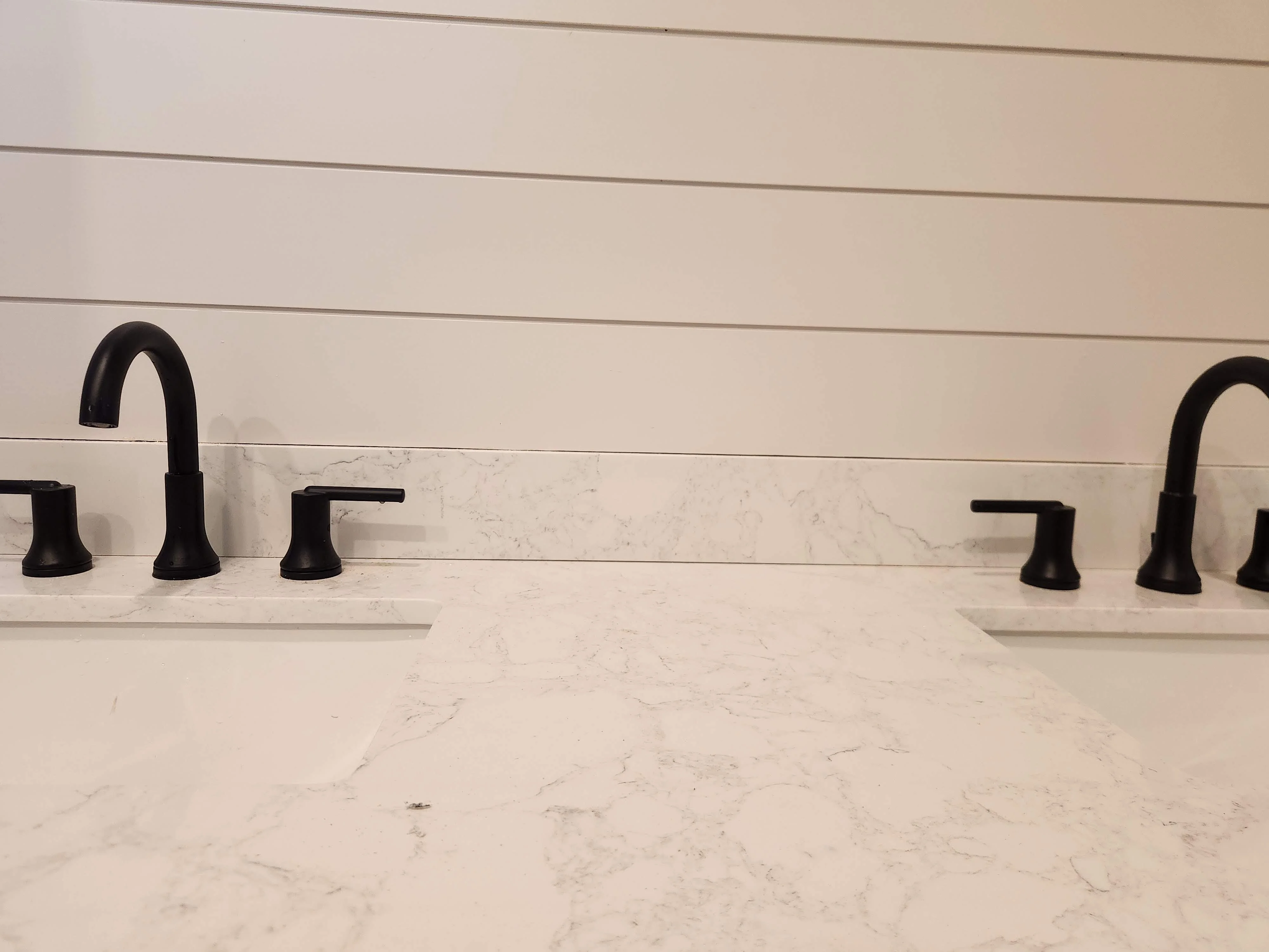 Finished bathroom counter and faucet detail