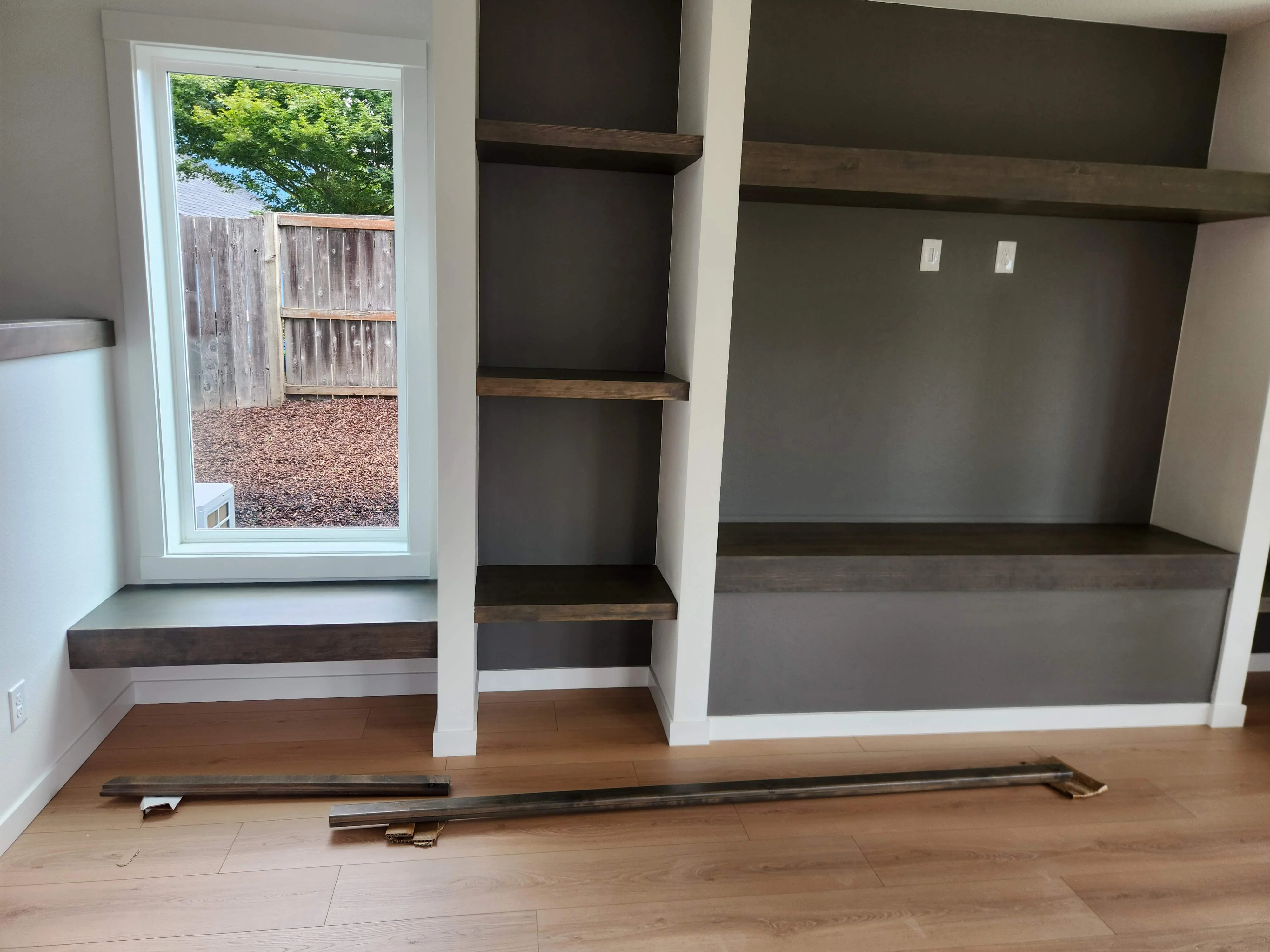 Built-in shelving and storage near a doorway