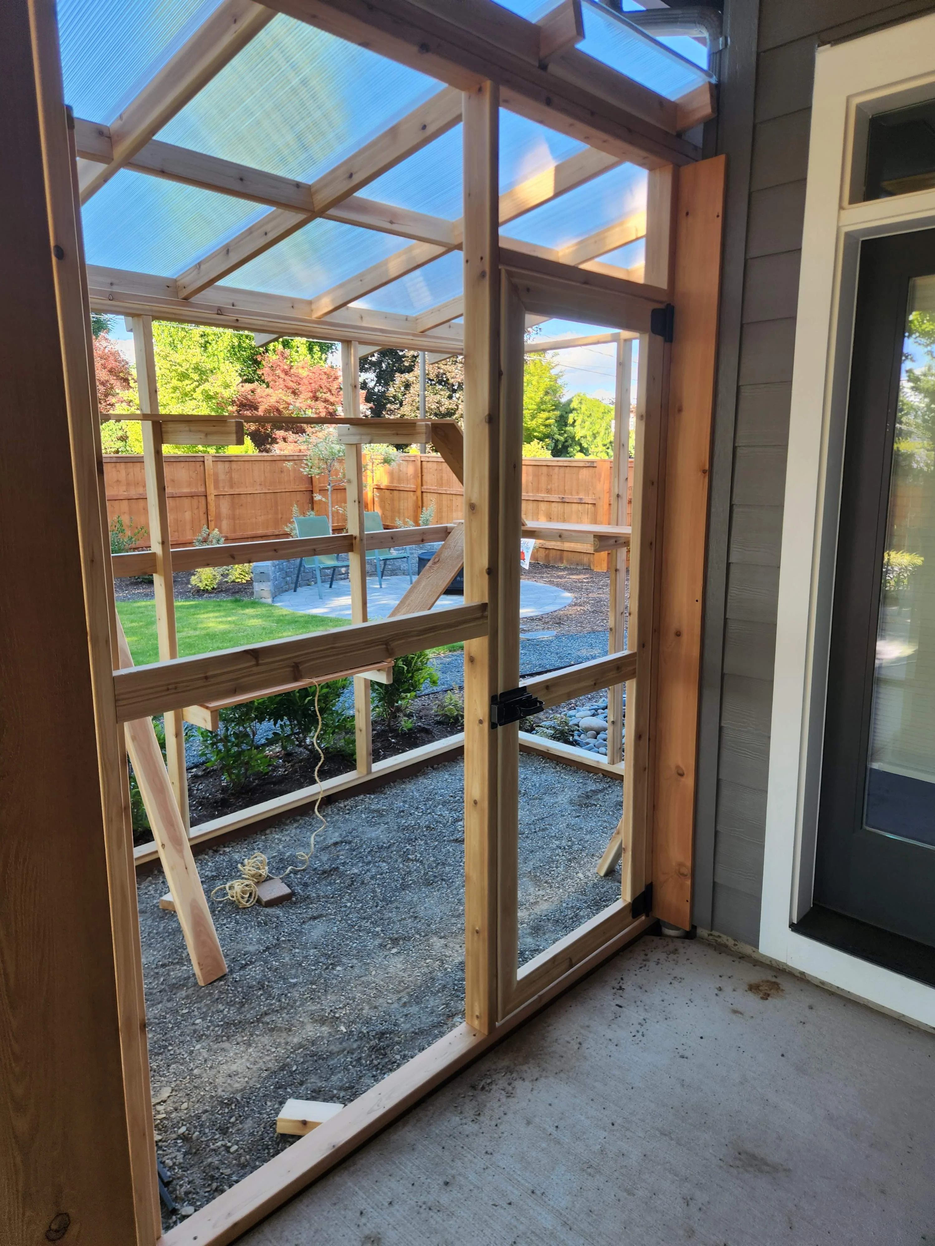 Catio enclosure doorway and screen framing