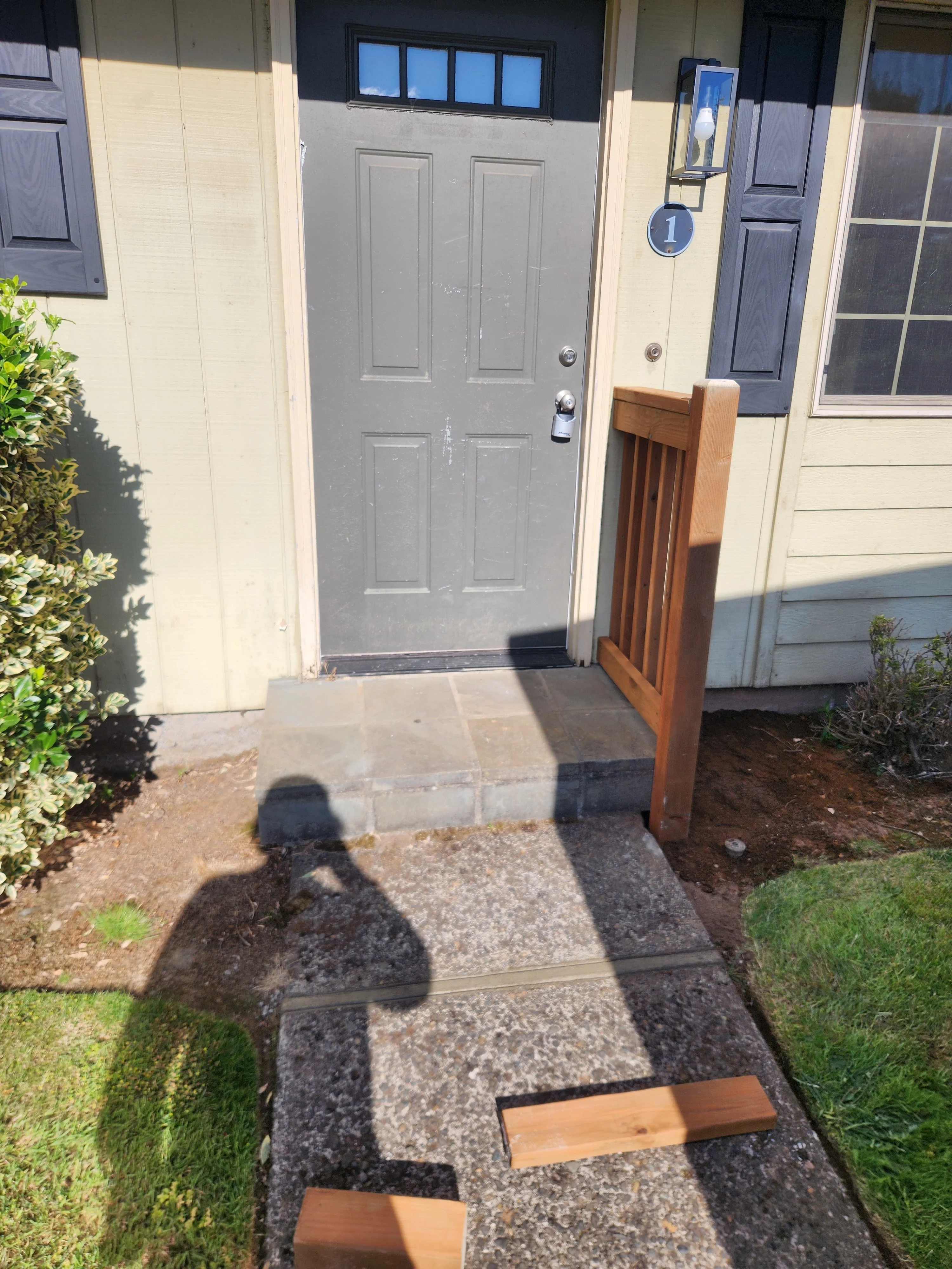 Finished front entry step and threshold repair
