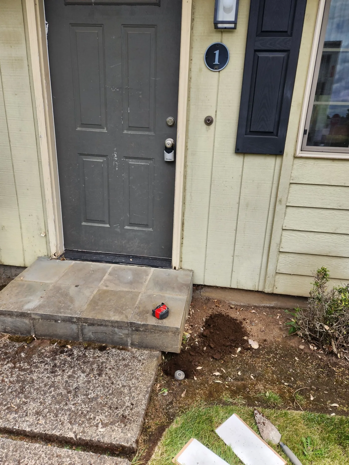 Leaning front step before repair