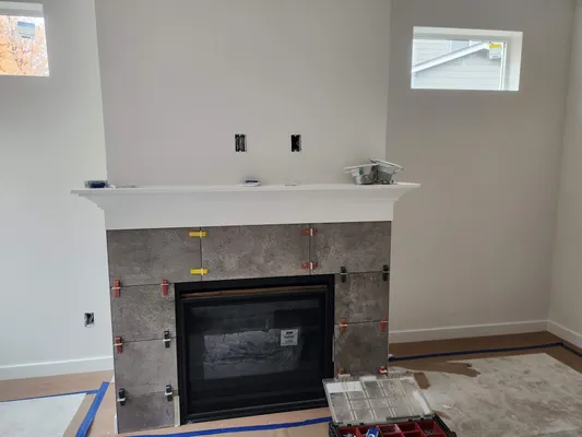 Tile fireplace surround and mantel